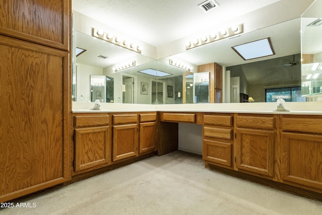 full bath with visible vents and vanity