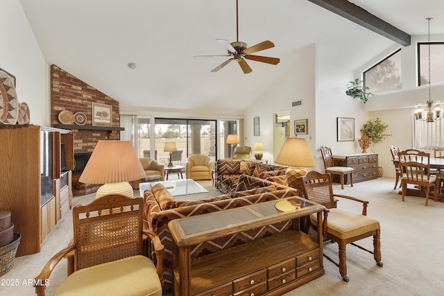 living area featuring light carpet, ceiling fan with notable chandelier, visible vents, a brick fireplace, and beam ceiling