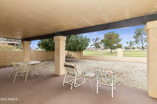 view of patio / terrace featuring outdoor dining space and a fenced backyard