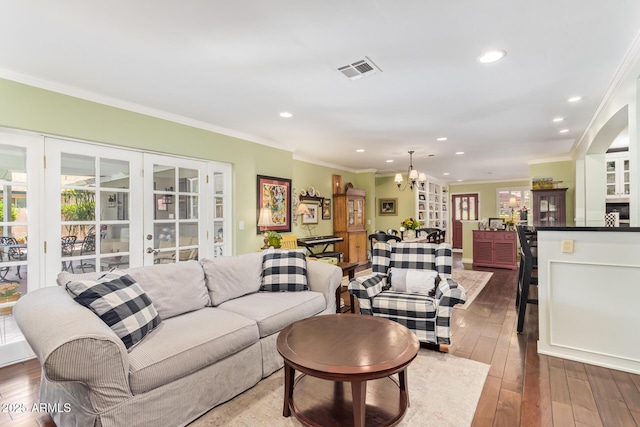 4710 N 33rd Pl, Phoenix, AZ 85018 - living room featuring french doors, a chandelier, crown molding, wood-type flooring, and recessed lighting