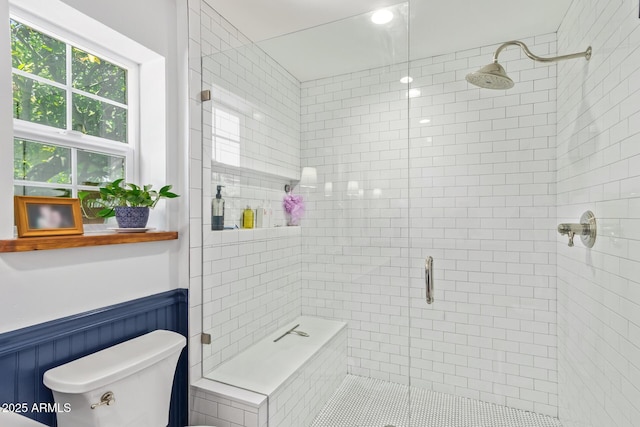4710 N 33rd Pl, Phoenix, AZ 85018 - bathroom featuring a stall shower and a wainscoted wall