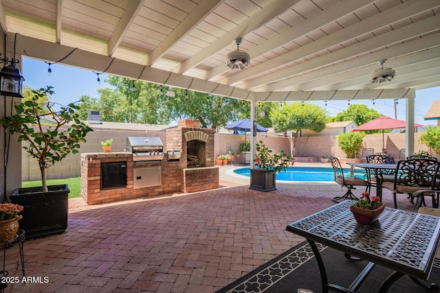 4710 N 33rd Pl, Phoenix, AZ 85018 - fenced backyard with area for grilling, a ceiling fan, a patio area, and outdoor dining space