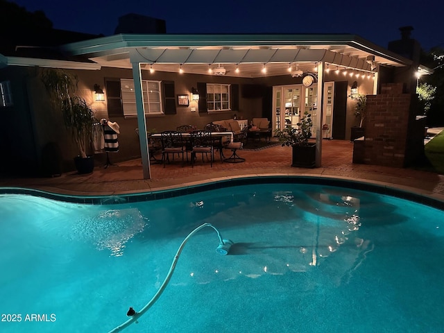 4710 N 33rd Pl, Phoenix, AZ 85018 - pool at twilight with an outdoor pool and a patio area