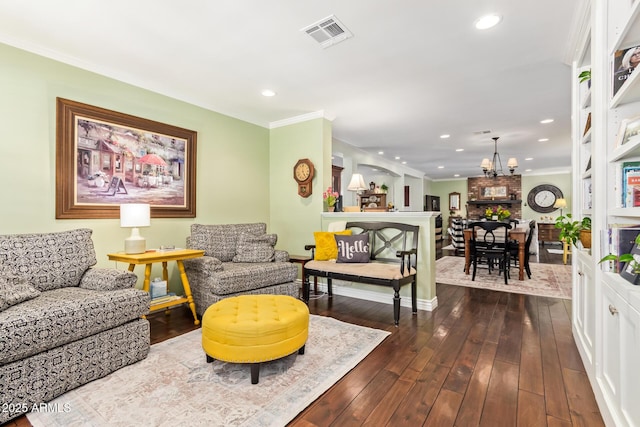 4710 N 33rd Pl, Phoenix, AZ 85018 - living area featuring ornamental molding, a chandelier, dark wood-style flooring, and recessed lighting