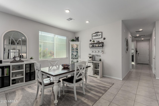 dining room featuring light tile patterned floors