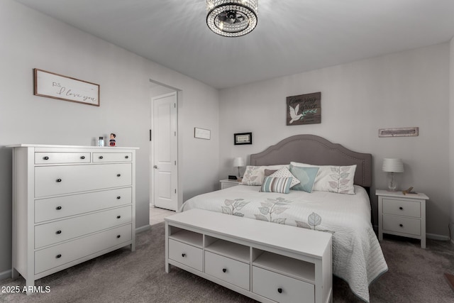 bedroom featuring dark colored carpet