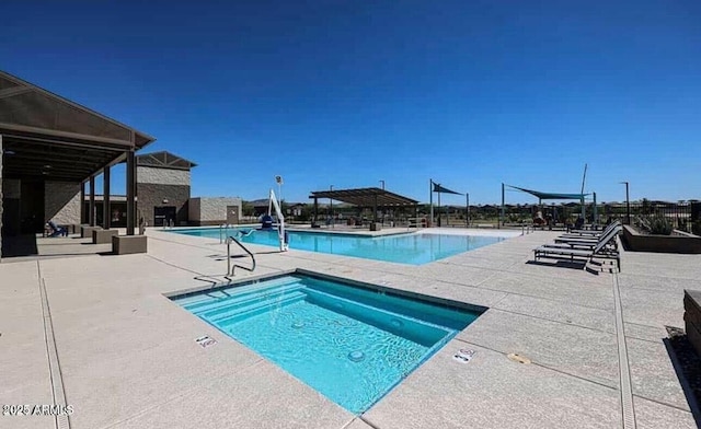 view of swimming pool featuring a patio