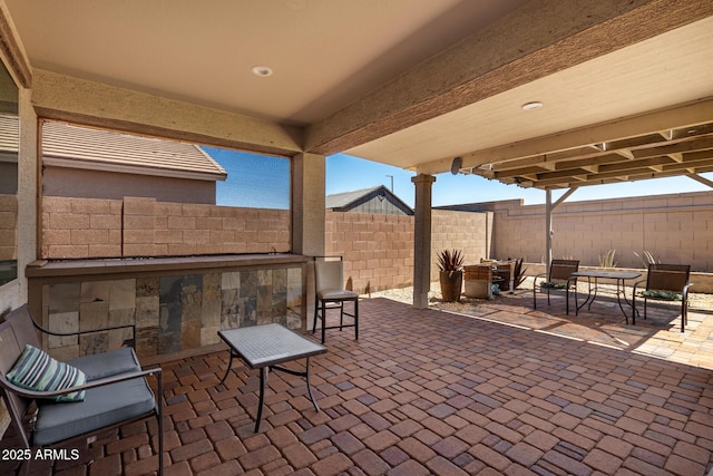 18669 W Vista Norte St, Goodyear, AZ 85338 - fenced backyard with a patio area and outdoor dining space