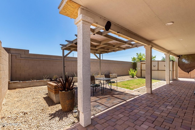18669 W Vista Norte St, Goodyear, AZ 85338 - fenced backyard featuring a patio and a shed