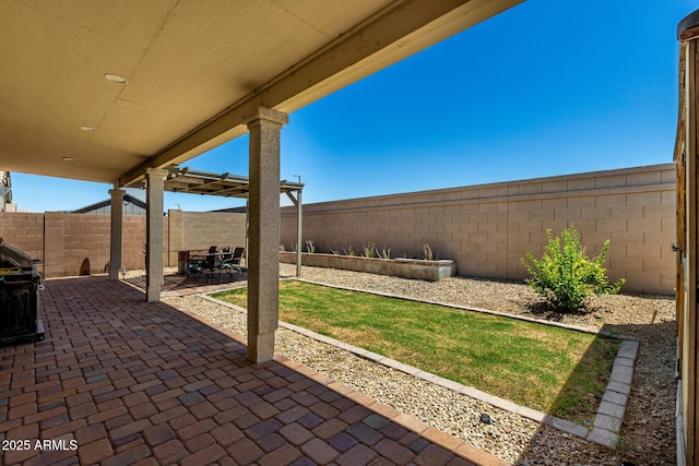 18669 W Vista Norte St, Goodyear, AZ 85338 - fenced backyard with a patio area