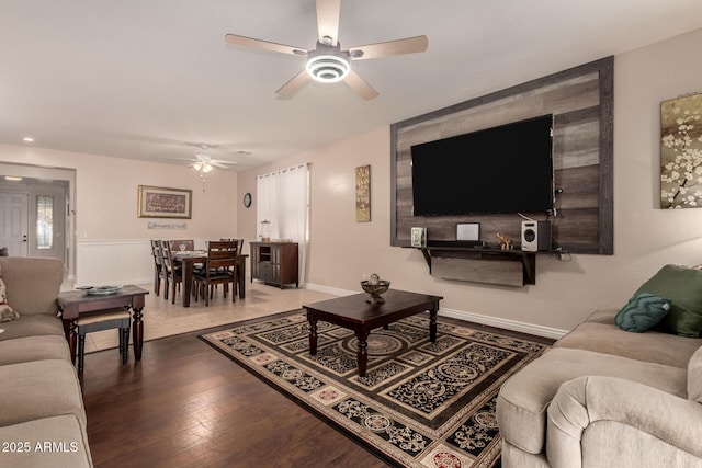 18669 W Vista Norte St, Goodyear, AZ 85338 - living room featuring a ceiling fan and wood finished floors
