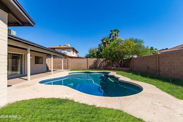 view of swimming pool featuring a patio area