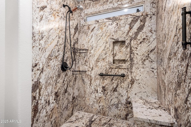 details with a tile shower