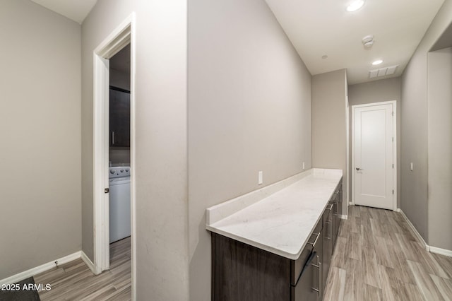 hall featuring light hardwood / wood-style flooring