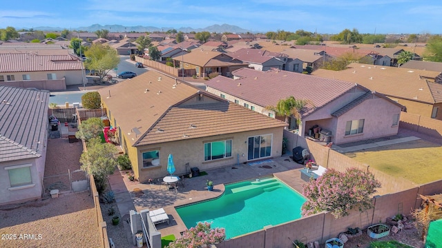 bird's eye view with a residential view and a mountain view