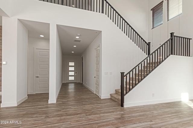 foyer entrance with light hardwood / wood-style flooring