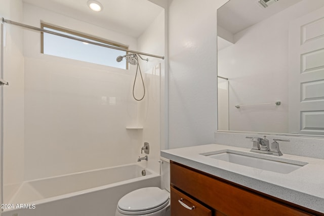 full bathroom featuring vanity, toilet, and shower / bathtub combination