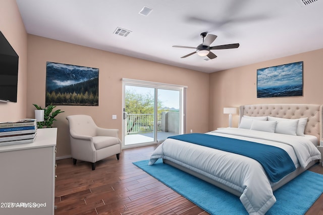 bedroom with ceiling fan, wood finished floors, visible vents, and access to exterior