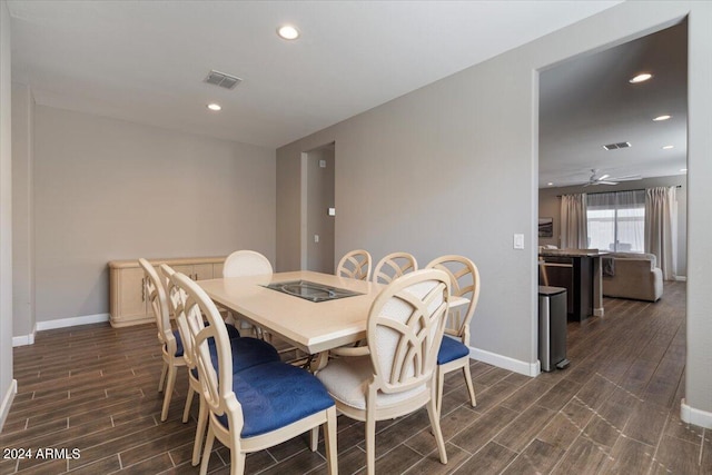 dining room featuring a ceiling fan, visible vents, recessed lighting, wood tiled floor, and baseboards