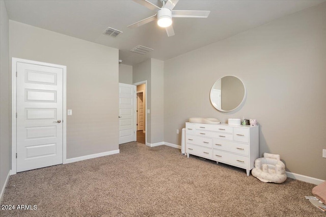 unfurnished bedroom with carpet floors and ceiling fan