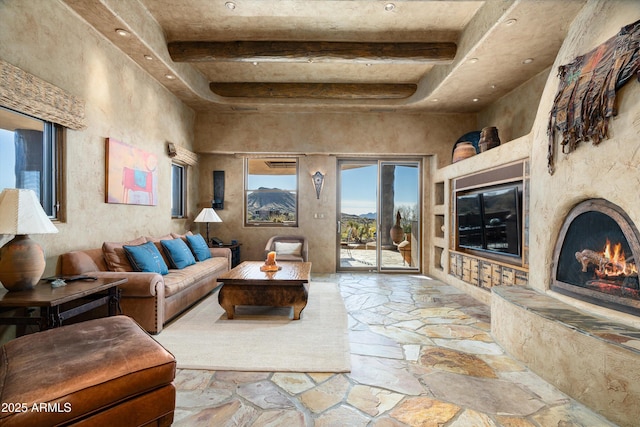 living room with beamed ceiling