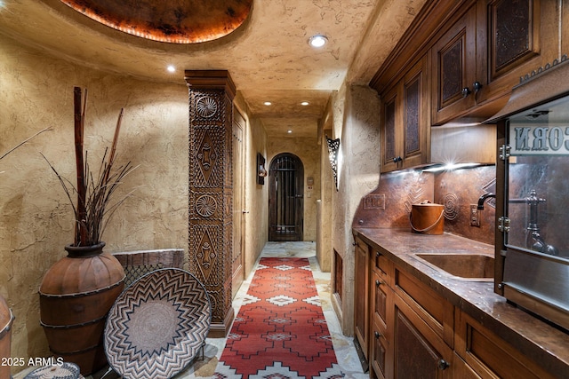 hallway featuring sink