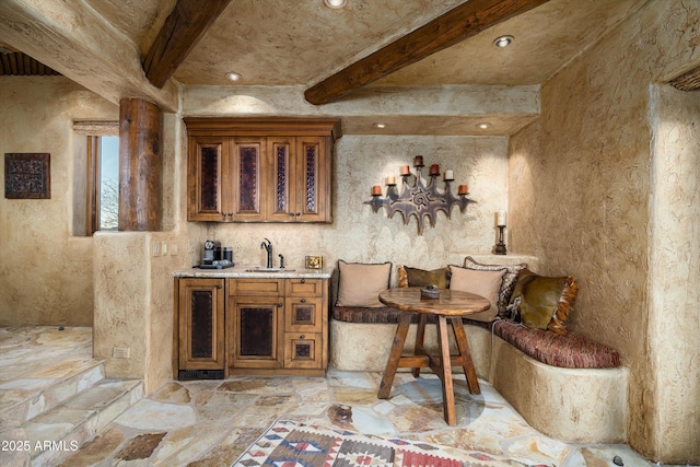 bar with beam ceiling and sink