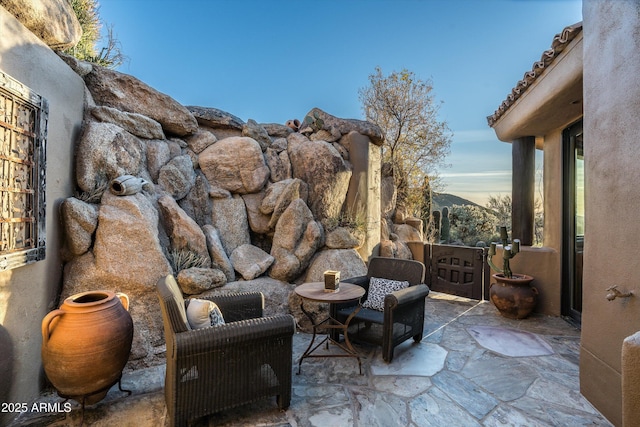 view of patio / terrace with a mountain view