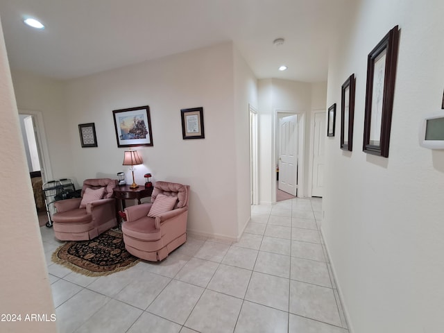 hallway featuring light tile patterned flooring