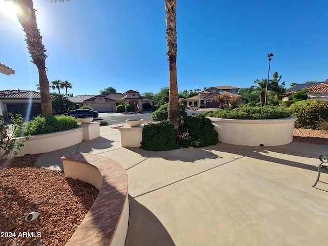 view of patio with a garage