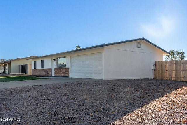 exterior space with a garage