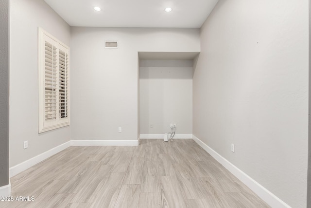 870 E Megan St, Gilbert, AZ 85295 - empty room featuring recessed lighting, light wood-type flooring, and baseboards