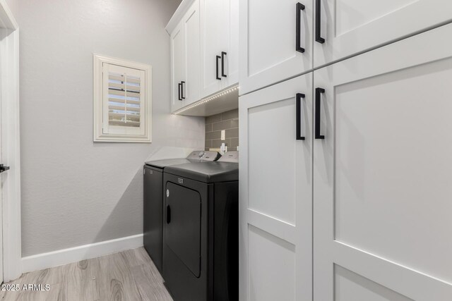 870 E Megan St, Gilbert, AZ 85295 - laundry room featuring cabinet space, separate washer and dryer, baseboards, and light wood finished floors
