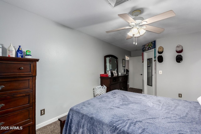 bedroom featuring carpet flooring, visible vents, a ceiling fan, and baseboards