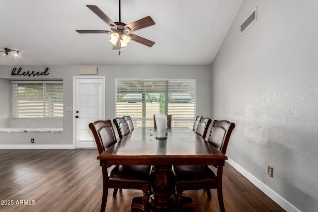 dining area with ceiling fan, visible vents, baseboards, and wood finished floors