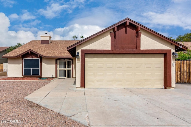 ranch-style home with stucco siding, driveway, fence, an attached garage, and a chimney