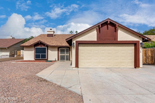 ranch-style house featuring concrete driveway, fence, a garage, and a chimney