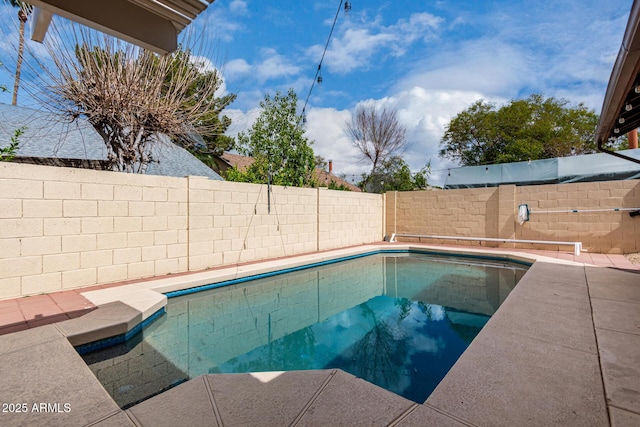 view of swimming pool featuring a fenced in pool and a fenced backyard