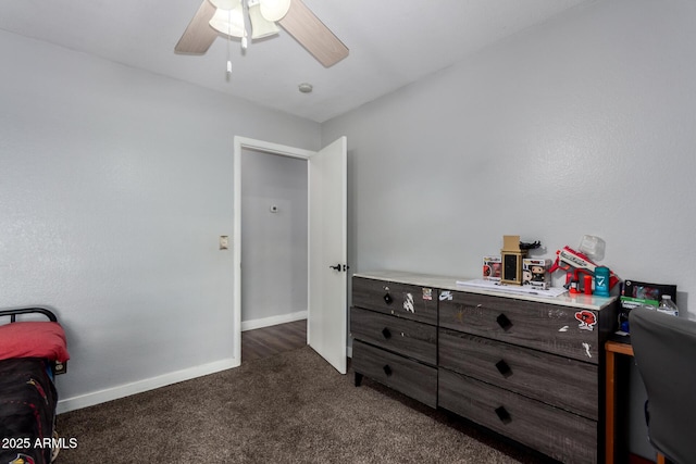 bedroom featuring baseboards, ceiling fan, and dark carpet