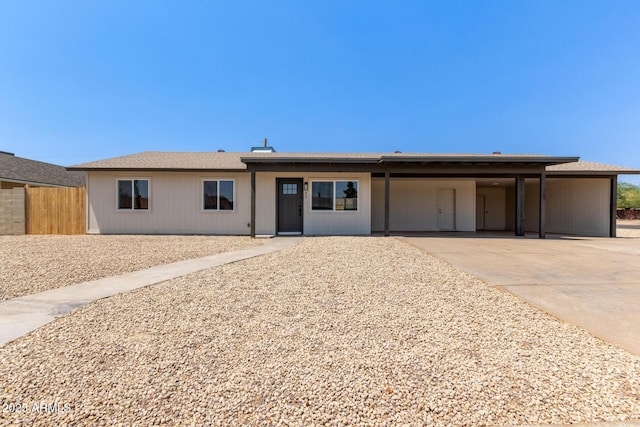 802 E Navajo Ave, Apache Junction, AZ 85119 - ranch-style home featuring an attached carport and concrete driveway