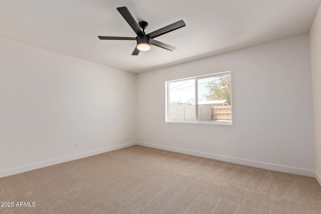 802 E Navajo Ave, Apache Junction, AZ 85119 - empty room with light carpet and a ceiling fan