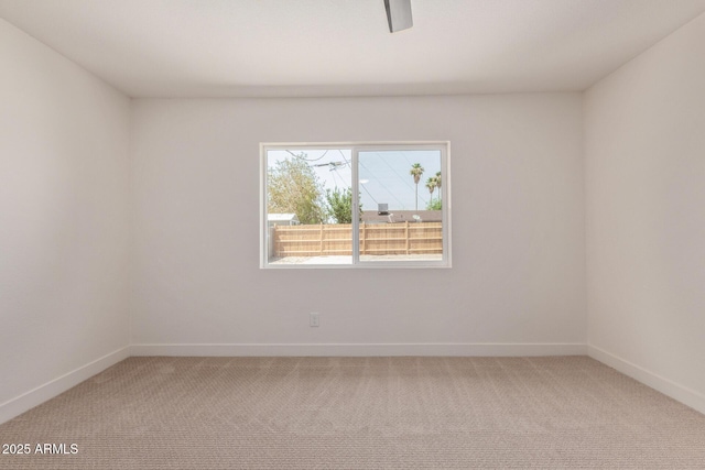 802 E Navajo Ave, Apache Junction, AZ 85119 - carpeted empty room featuring baseboards