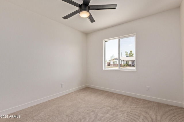 802 E Navajo Ave, Apache Junction, AZ 85119 - empty room with light colored carpet and a ceiling fan