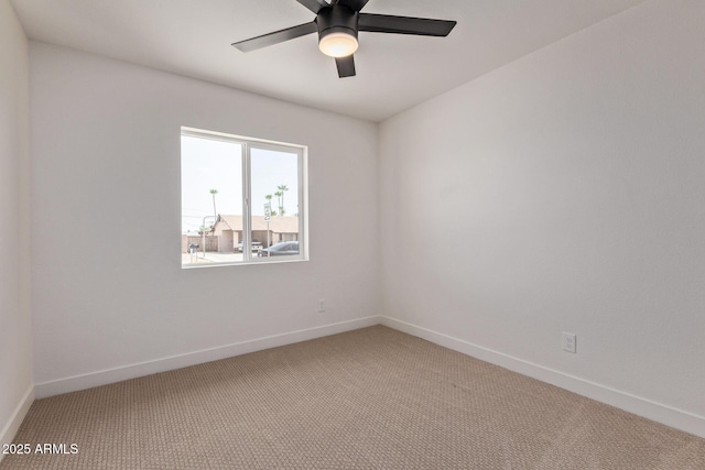 802 E Navajo Ave, Apache Junction, AZ 85119 - empty room featuring light carpet and ceiling fan