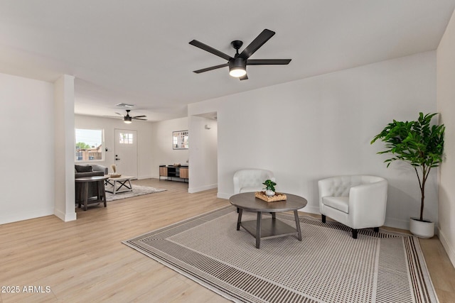802 E Navajo Ave, Apache Junction, AZ 85119 - living area featuring ceiling fan and light wood finished floors
