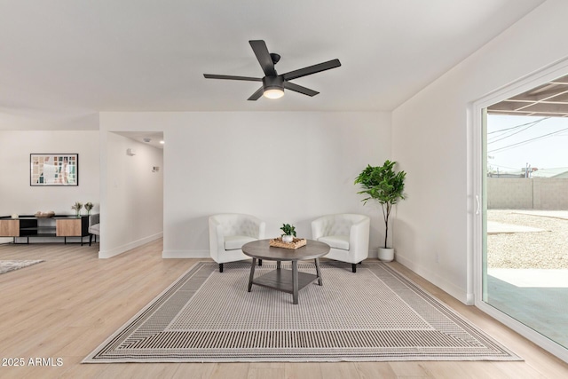802 E Navajo Ave, Apache Junction, AZ 85119 - living area featuring a ceiling fan and light wood-type flooring
