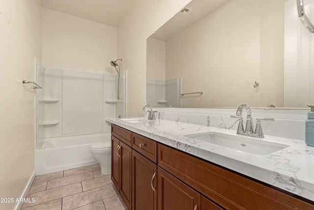 full bathroom with toilet, vanity, tub / shower combination, and tile patterned floors