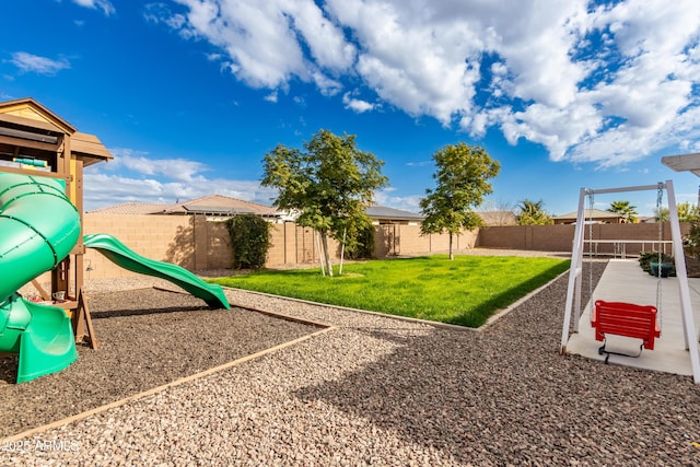 view of playground featuring a lawn