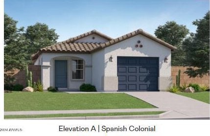 mediterranean / spanish-style home with a front yard and a garage