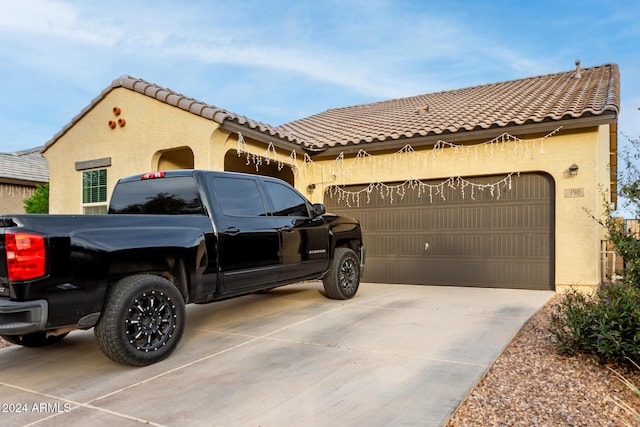 view of front of property featuring a garage